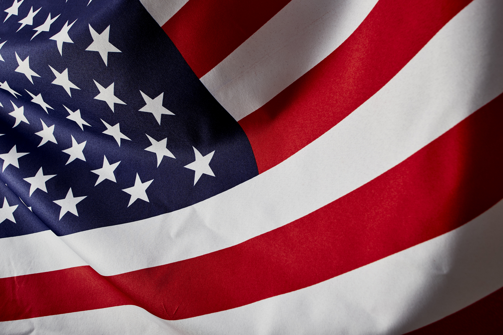 Close Up American Flag wave, Memorial Day or 4th of July, studio shot.