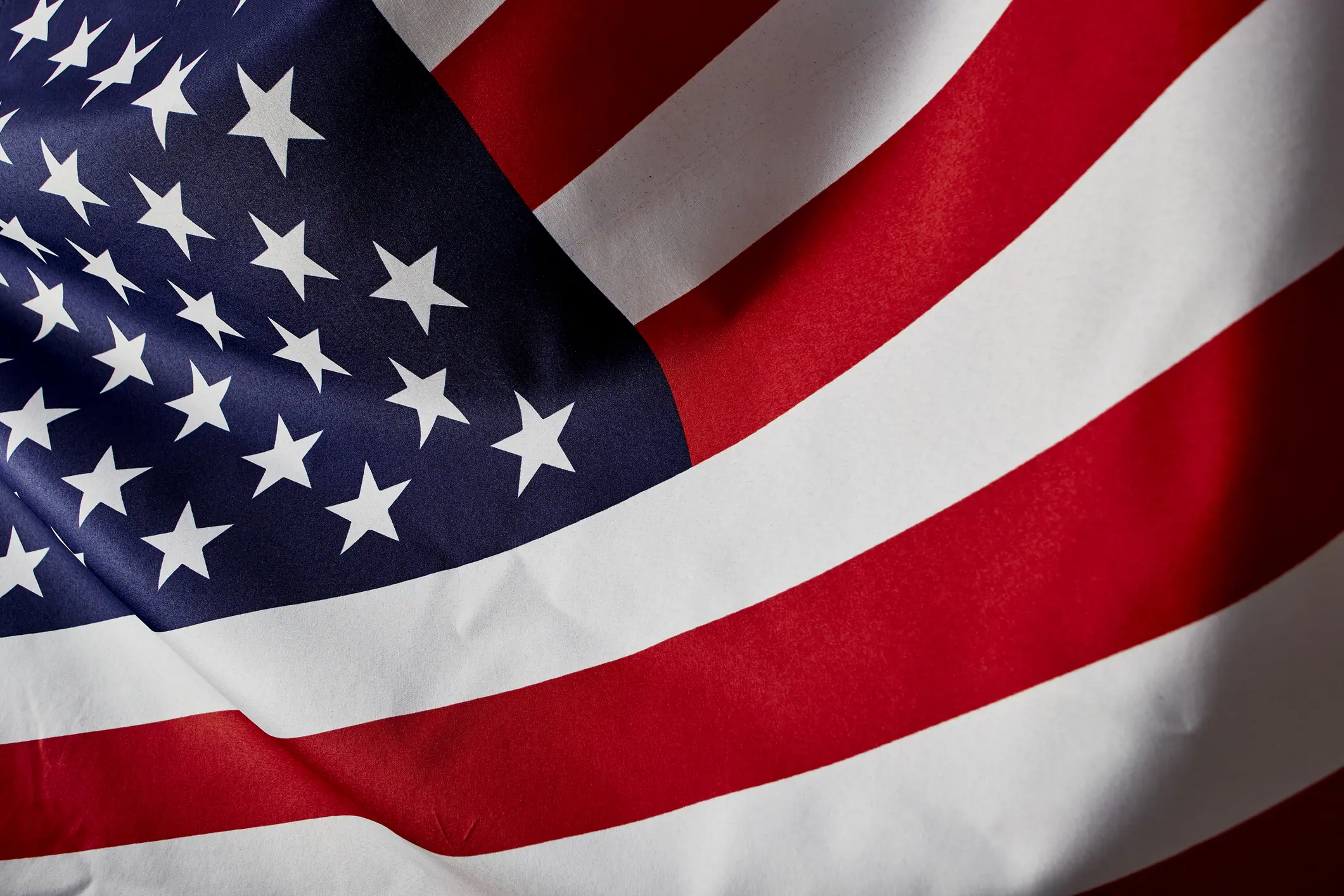 Close Up American Flag wave, Memorial Day or 4th of July, studio shot.